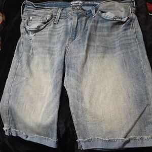 Signature Light Blue Distressed Denim Shorts